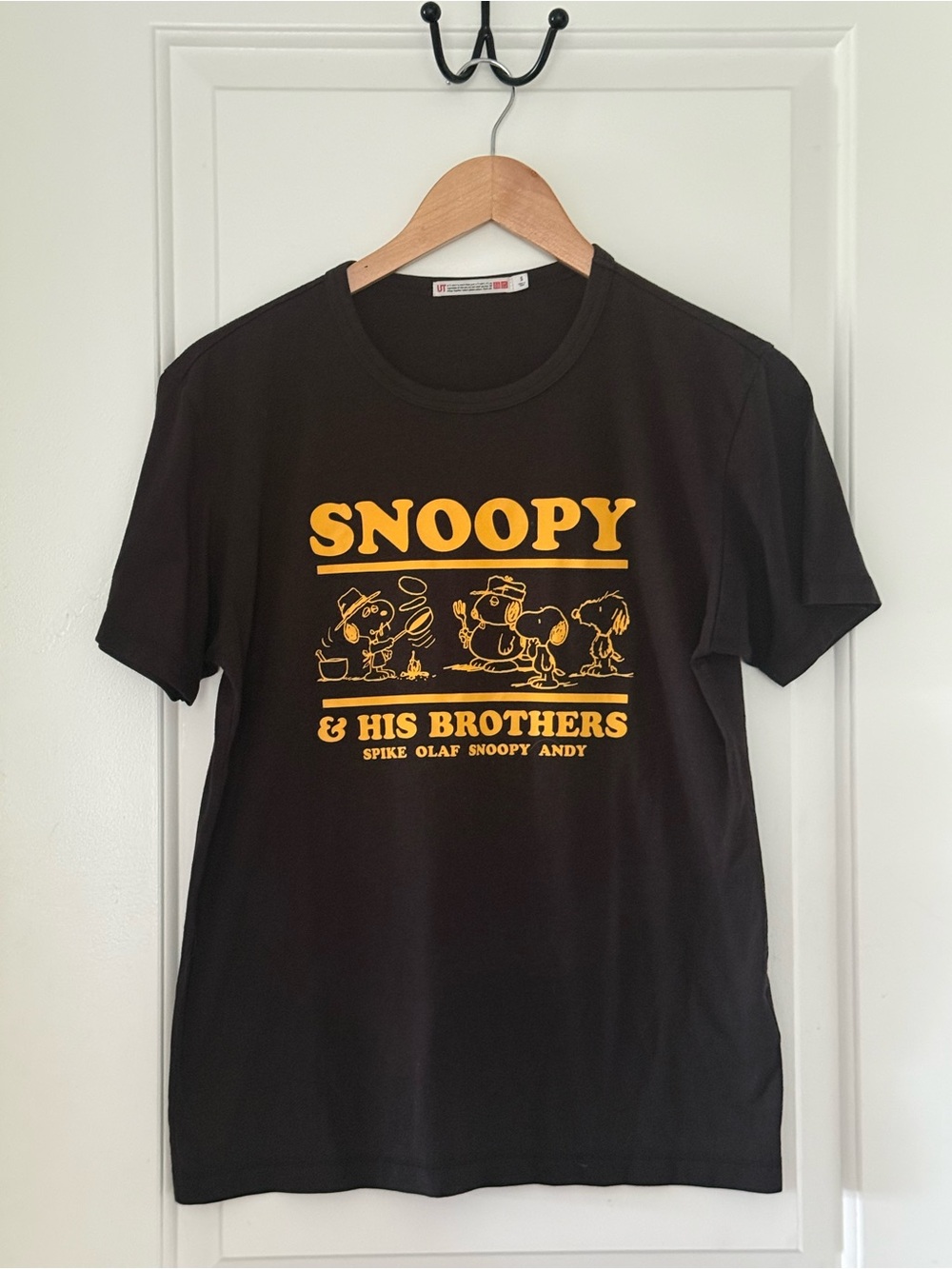 Uniqlo Black T-Shirt with Yellow Snoopy Graphic
